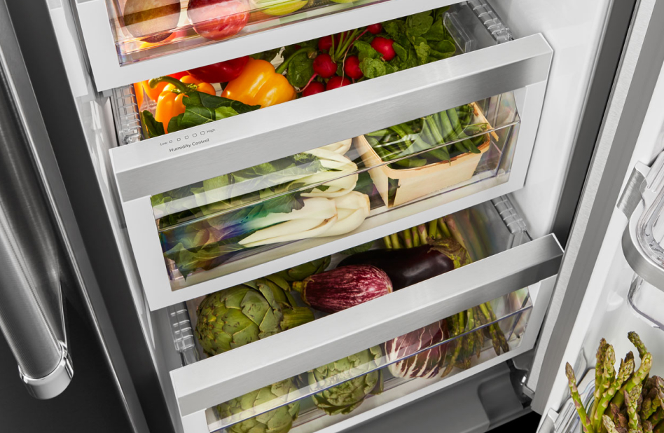 Fresh produce stored in clear bins. Fresh produce stored in clear bins.