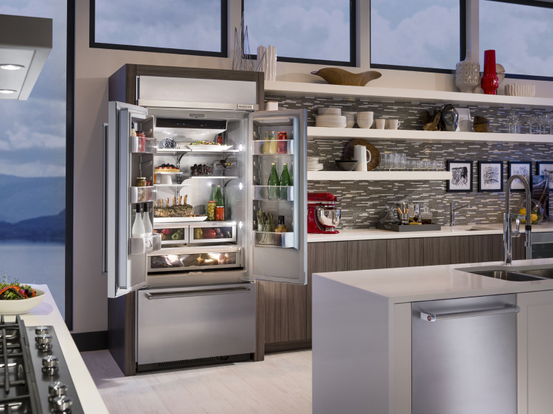 Refrigerator open to show contents Refrigerator open to show contents