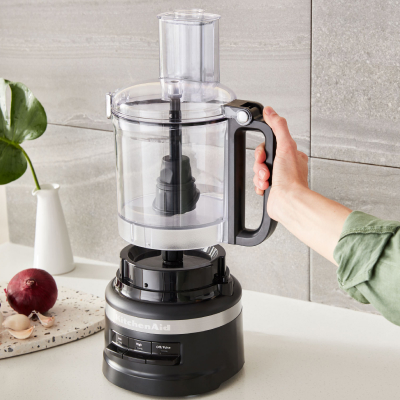 Person assembling a KitchenAid® food processor
