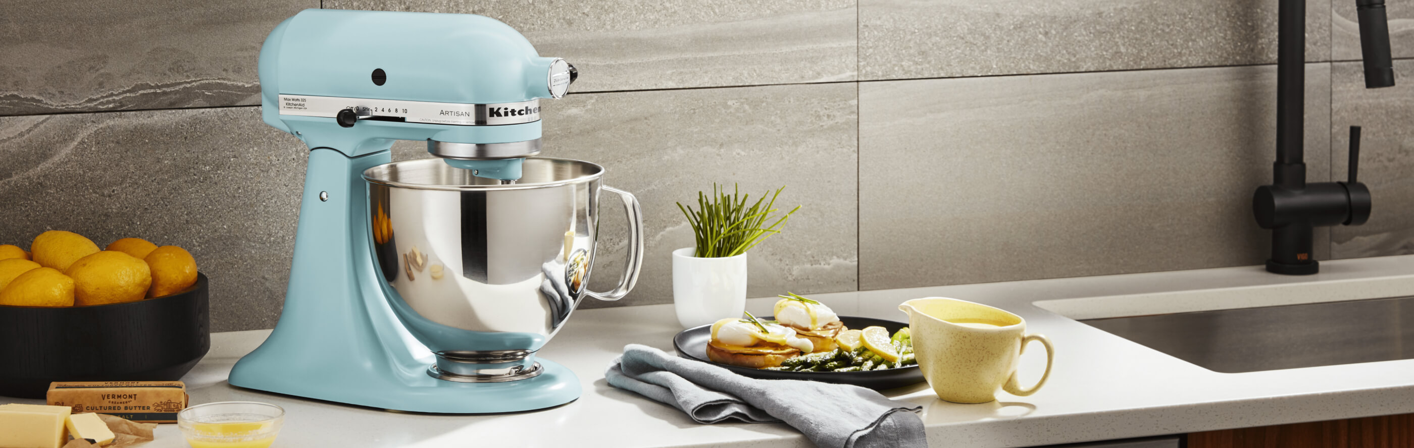 KitchenAid® stand mixer on a modern kitchen counter.