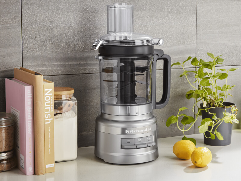 KitchenAid® food processor on a modern kitchen counter. KitchenAid® food processor on a modern kitchen counter.
