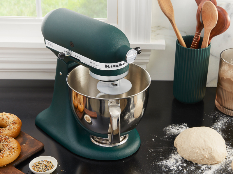 Bagel dough on a countertop next to a blue-green KitchenAid® stand mixer Bagel dough on a countertop next to a blue-green KitchenAid® stand mixer