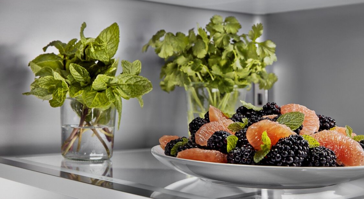 Fruit salad garnished with fresh mint Fruit salad garnished with fresh mint