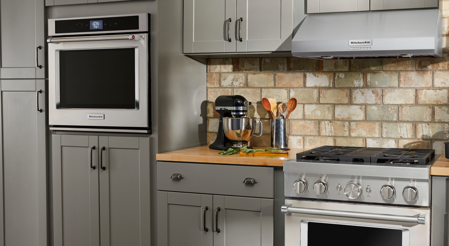 KitchenAid® appliances in a modern kitchen. KitchenAid® appliances in a modern kitchen.