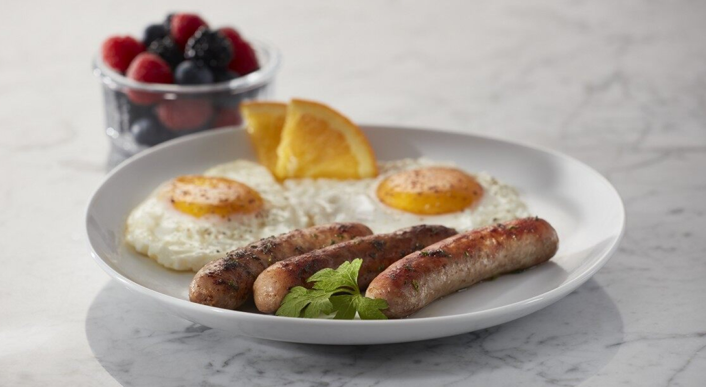Sausages on a plate with eggs Sausages on a plate with eggs