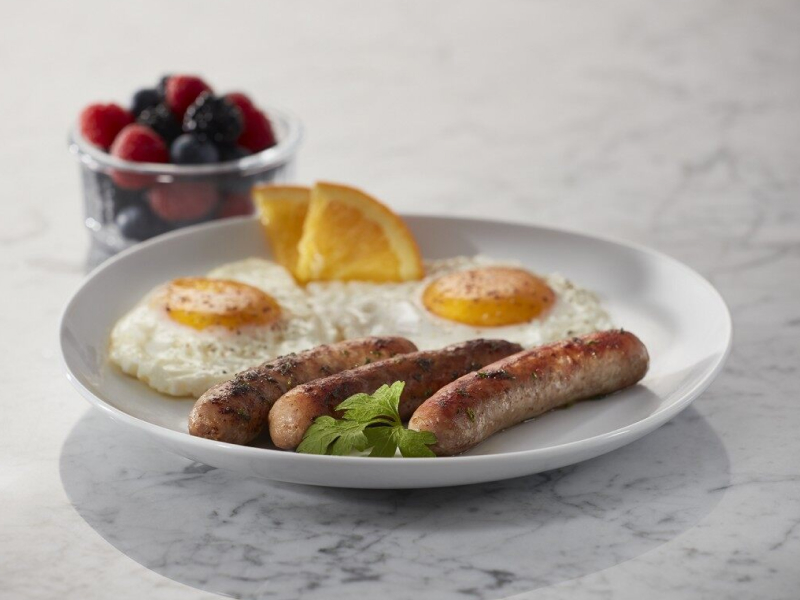 Sausages on a plate with eggs Sausages on a plate with eggs