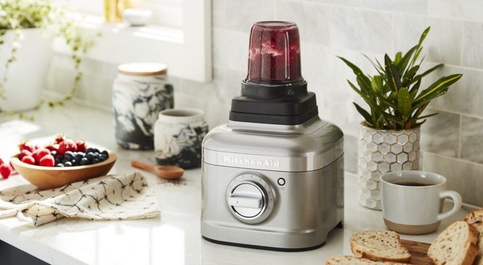KitchenAid® blender with a personal jar filled with berry mixture KitchenAid® blender with a personal jar filled with berry mixture