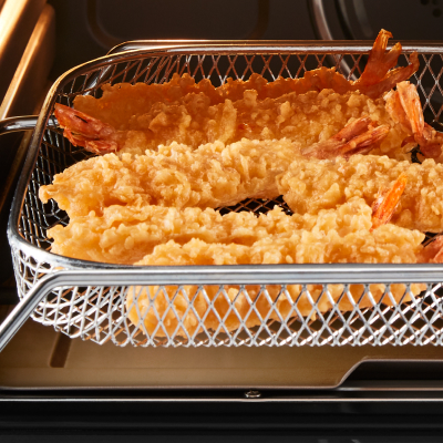 Shrimp in air fry basket.