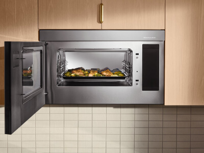 Open microwave with food inside