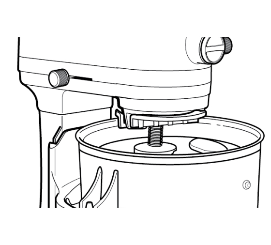 Freeze bowl being lifted into position on stand mixer
