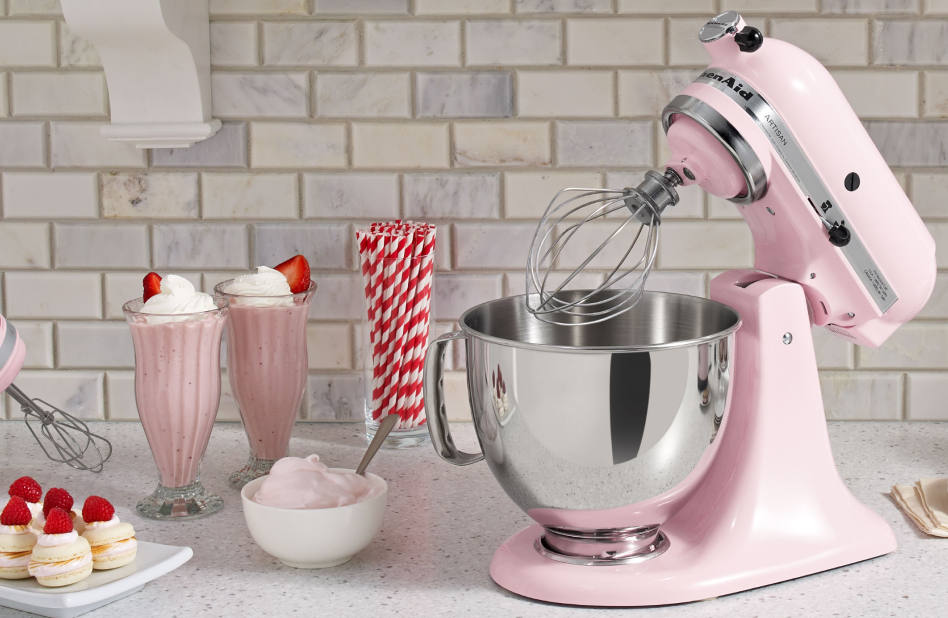 Pink stand mixer surrounded by homemade ice cream recipes  Pink stand mixer surrounded by homemade ice cream recipes