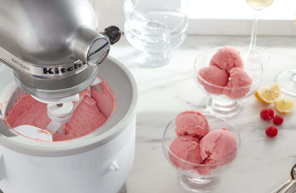 Silver stand mixer with ice cream maker attachment churning raspberry lemon ice cream Silver stand mixer with Ice Cream Maker attachment churning raspberry lemon ice cream