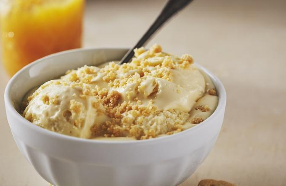 Bowl of homemade ice cream with spoon Bowl of homemade ice cream with spoon