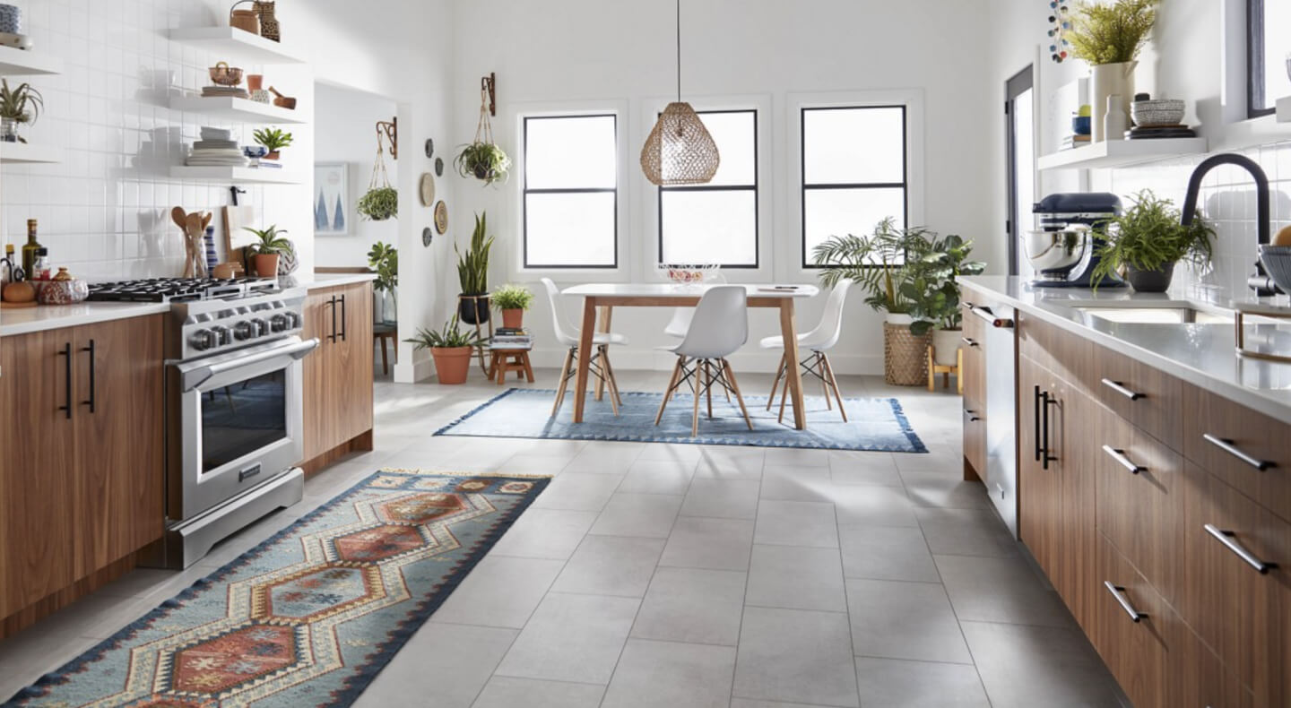 Stainless steel KitchenAid® gas range in a contemporary kitchen Stainless steel KitchenAid® gas range in a contemporary kitchen