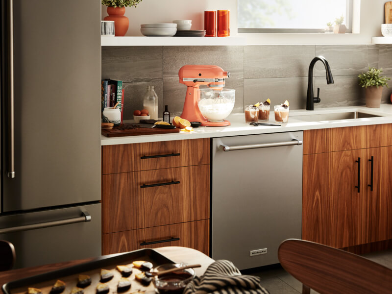 Orange KitchenAid® stand mixer on countertop Orange KitchenAid® stand mixer on countertop