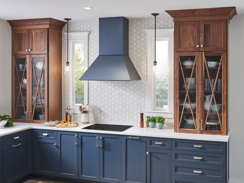 Wall-mount range hood over an electric cooktop Wall-mount range hood over an electric cooktop