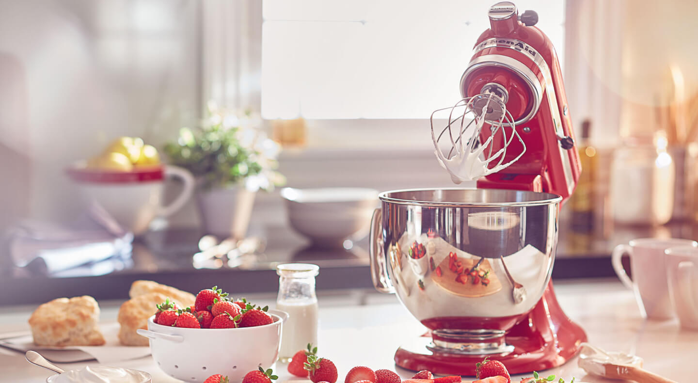 KitchenAid® stand mixer making whipped cream and strawberry shortcake KitchenAid® stand mixer making whipped cream and strawberry shortcake