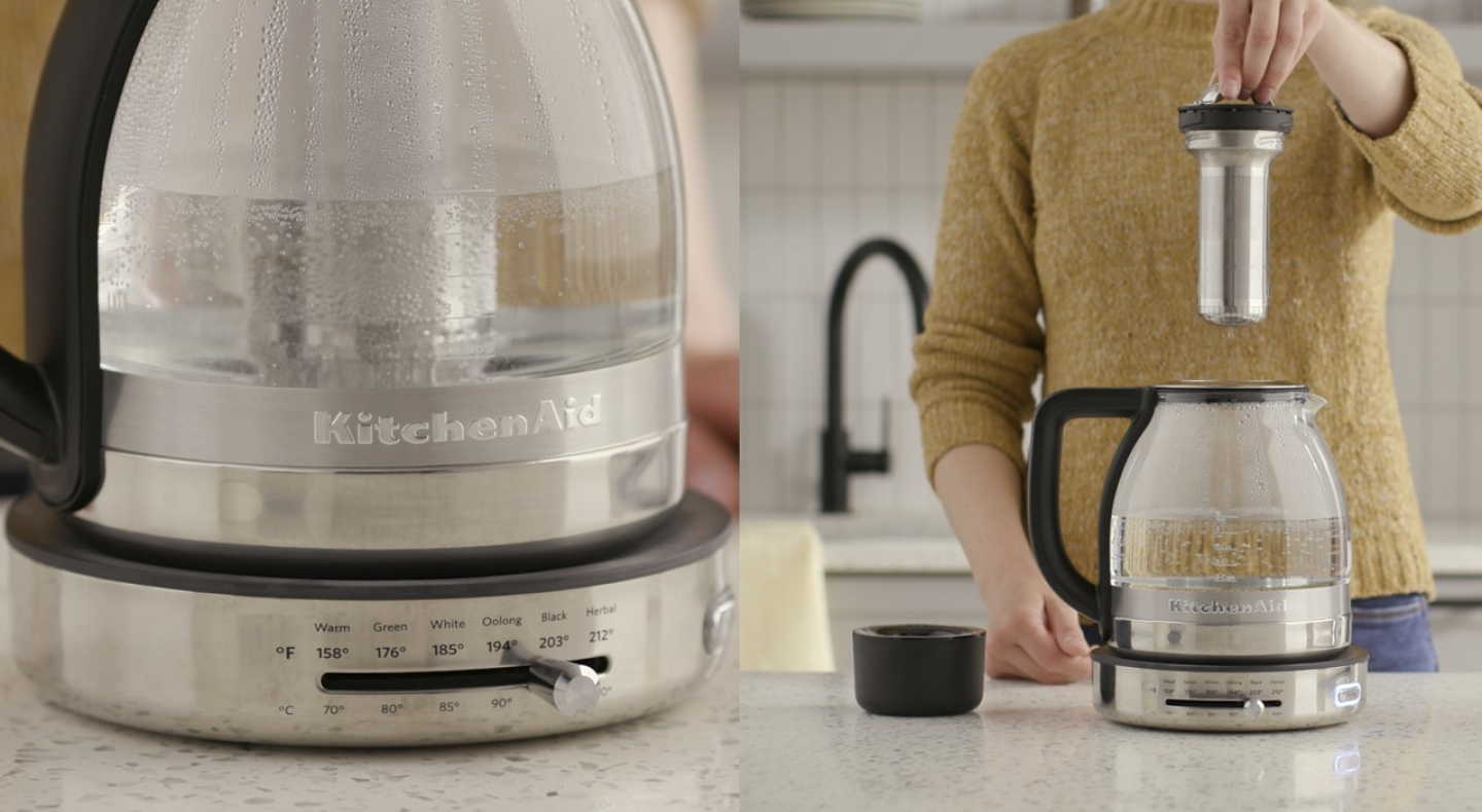 Base of electric tea kettle displaying temperature settings for different types of tea. Glass KitchenAid® electric tea kettle with infusing insert