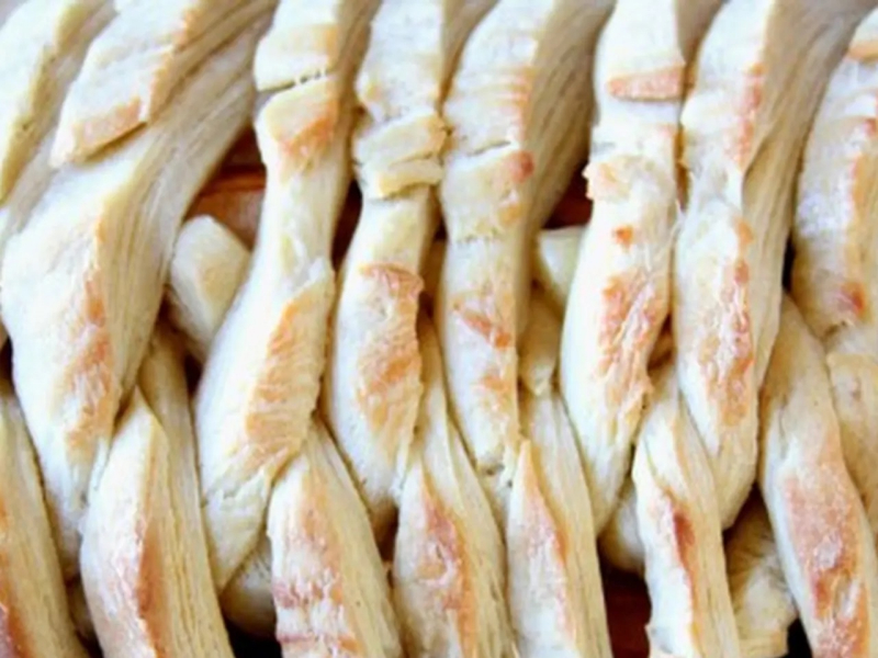 Close-up of fresh pear and fig danish braid pastry