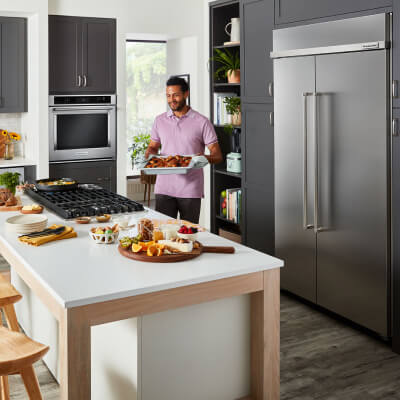 A kitchen that fits a KitchenAid® large capacity refrigerator