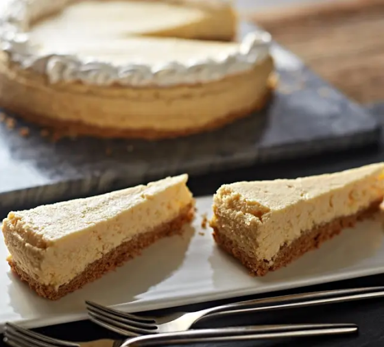 Cheesecake with two slices on platter