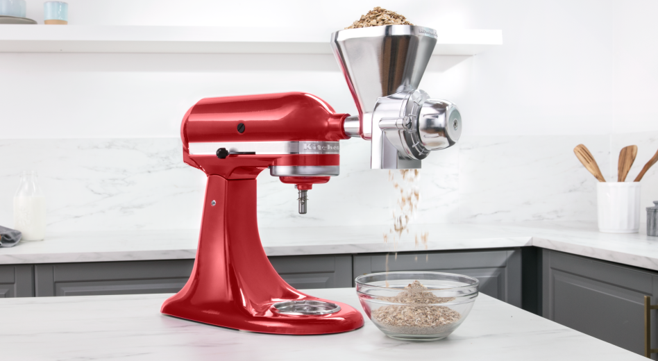 A KitchenAid® stand mixer fitted with an All Metal Grain Mill attachment A KitchenAid® stand mixer fitted with an All Metal Grain Mill attachment