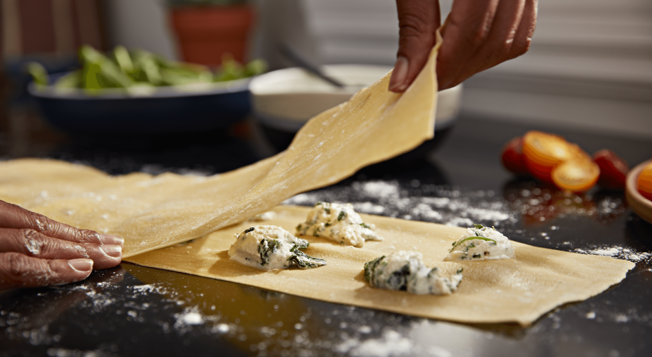 Making homemade ravioli pasta with cheese filling Making homemade ravioli pasta with cheese filling