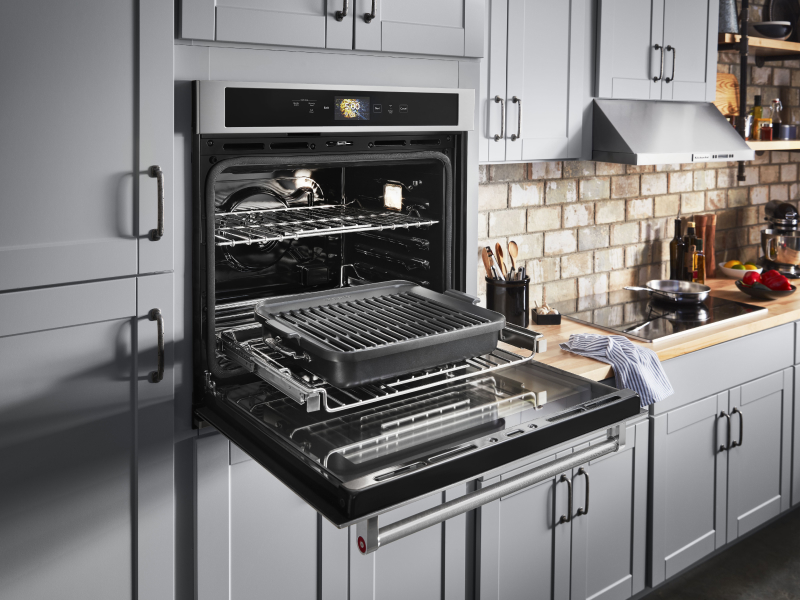 Open KitchenAid® wall oven with Powered Attachment