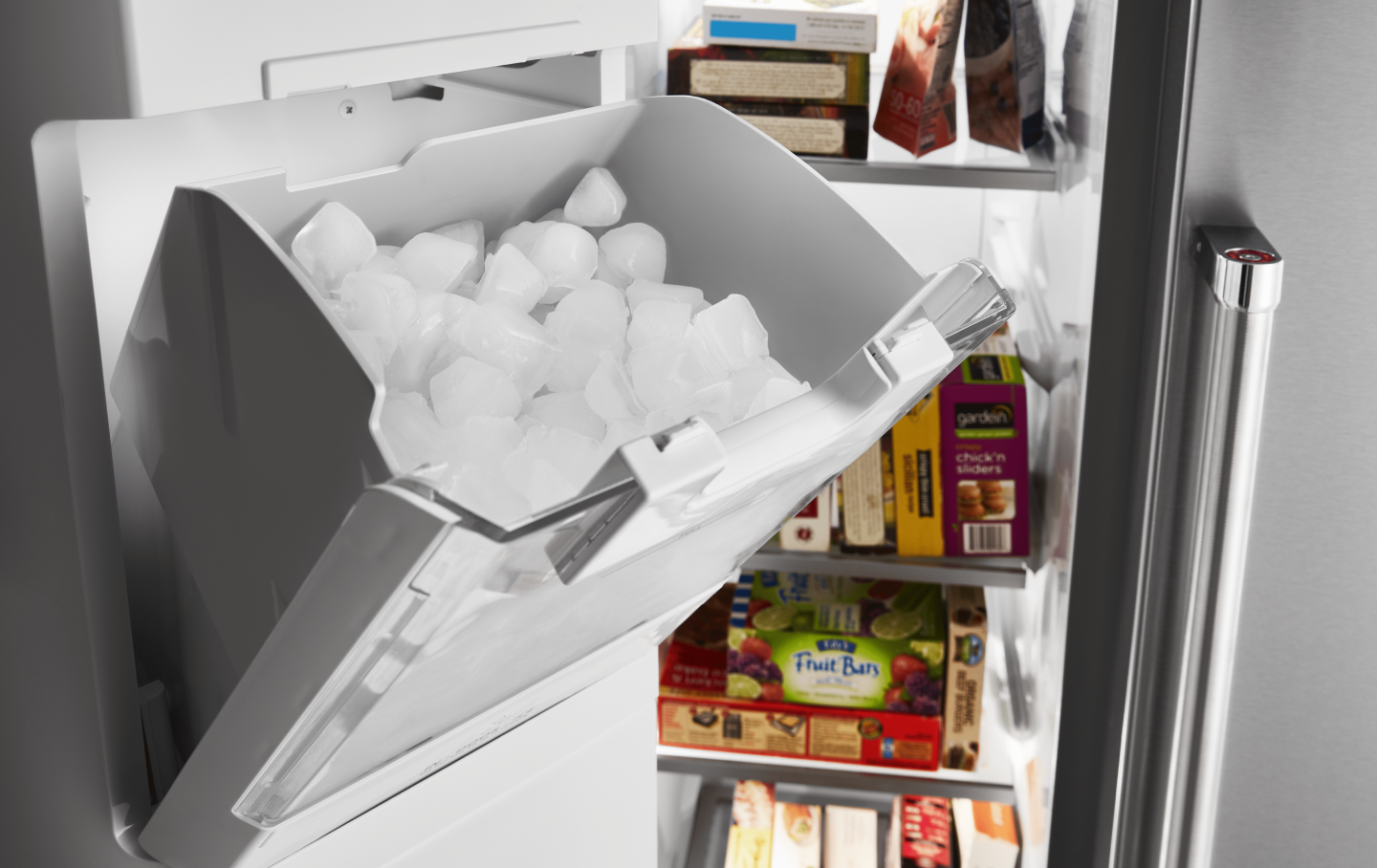 Full ice bin inside freezer door Full ice bin inside freezer door