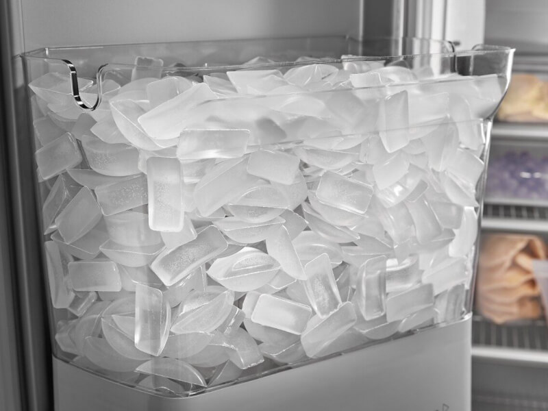 Built-in ice maker filled with ice