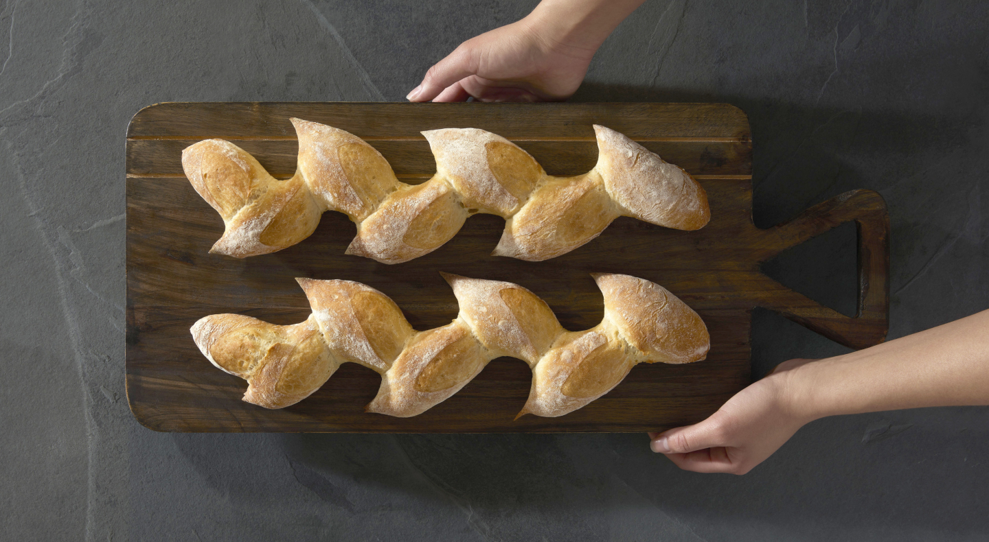 Homemade bread loaves in a wavy pattern Homemade bread loaves in a wavy pattern