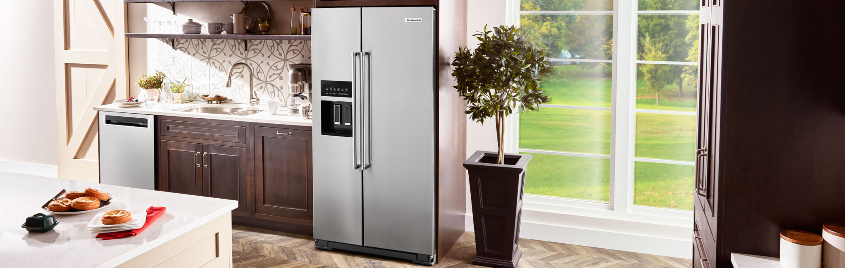 KitchenAid® side by side refrigerator in a kitchen