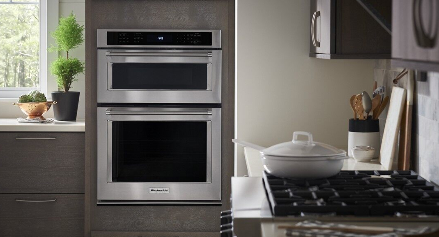 A KitchenAid® stainless steel combination wall oven A KitchenAid® stainless steel combination wall oven