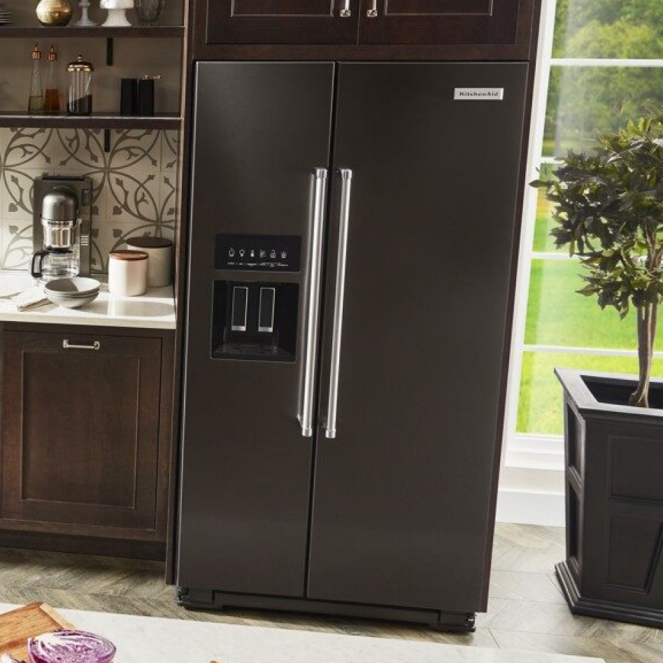Black stainless steel full-depth refrigerator style in kitchen Black stainless steel full-depth refrigerator style in kitchen