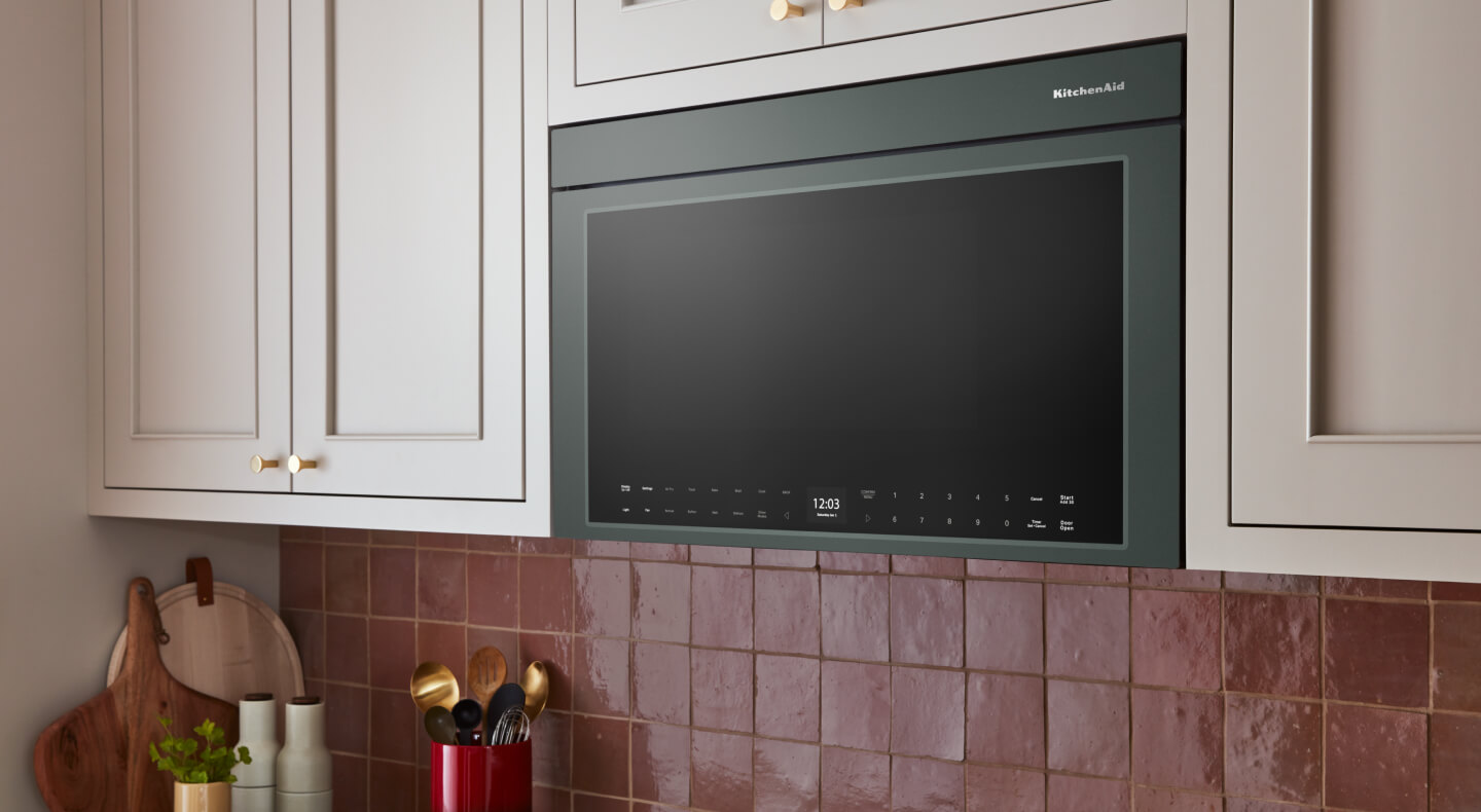 KitchenAid® Juniper over-the-range microwave in neutral-colored cabinetry