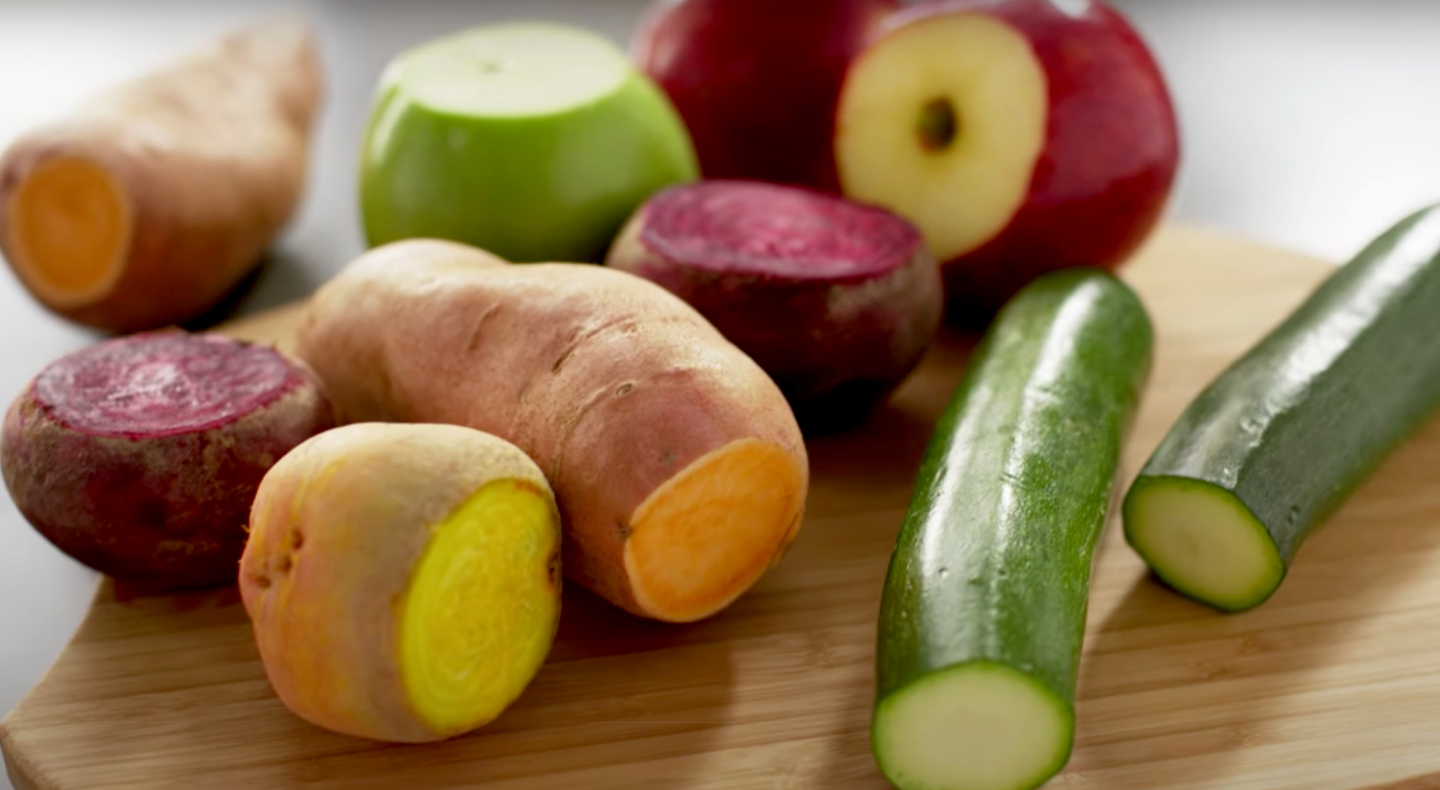 A variety of vegetables on a cutting board A variety of vegetables on a cutting board