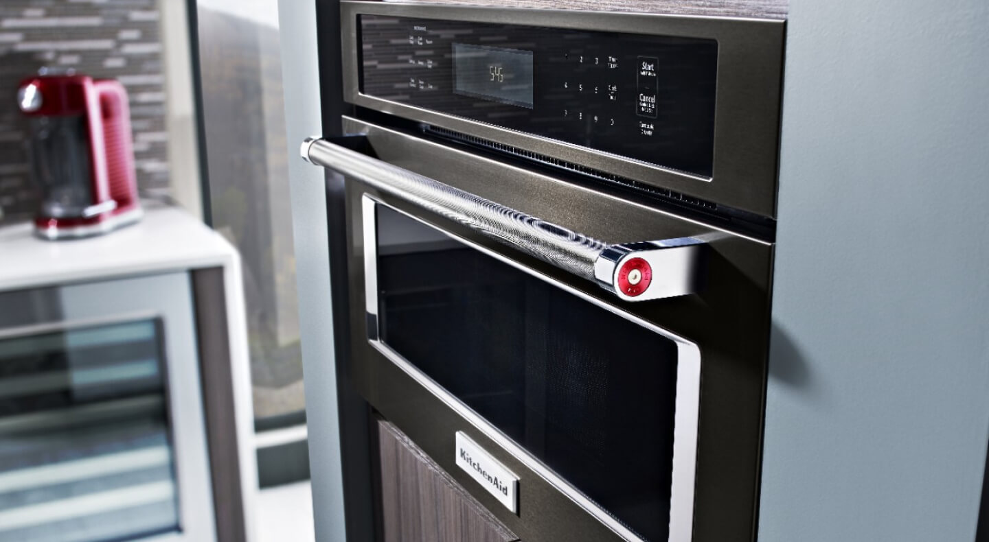 A KitchenAid® Over-the-Range Convection Microwave in a kitchen