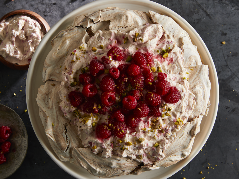 A chocolate pistachio pavlova with raspberry cream. A chocolate pistachio pavlova with raspberry cream.