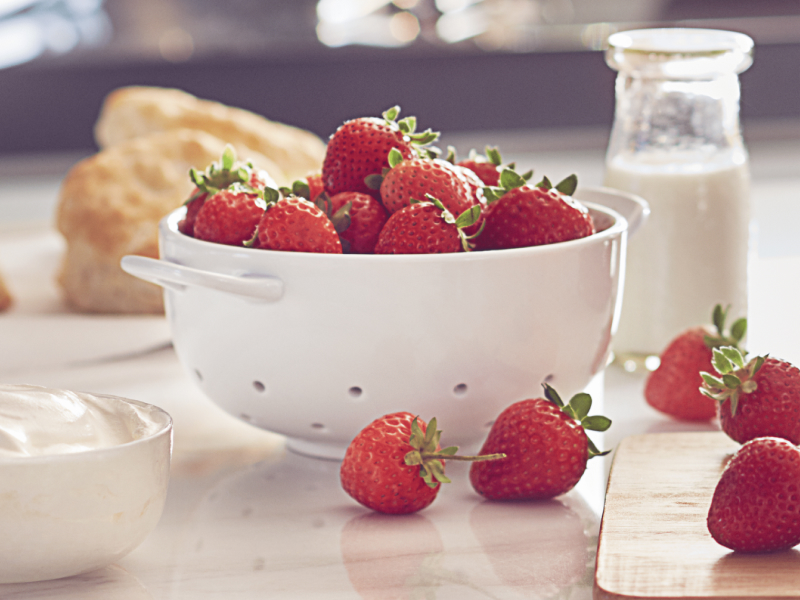 A bowl of fresh strawberries.