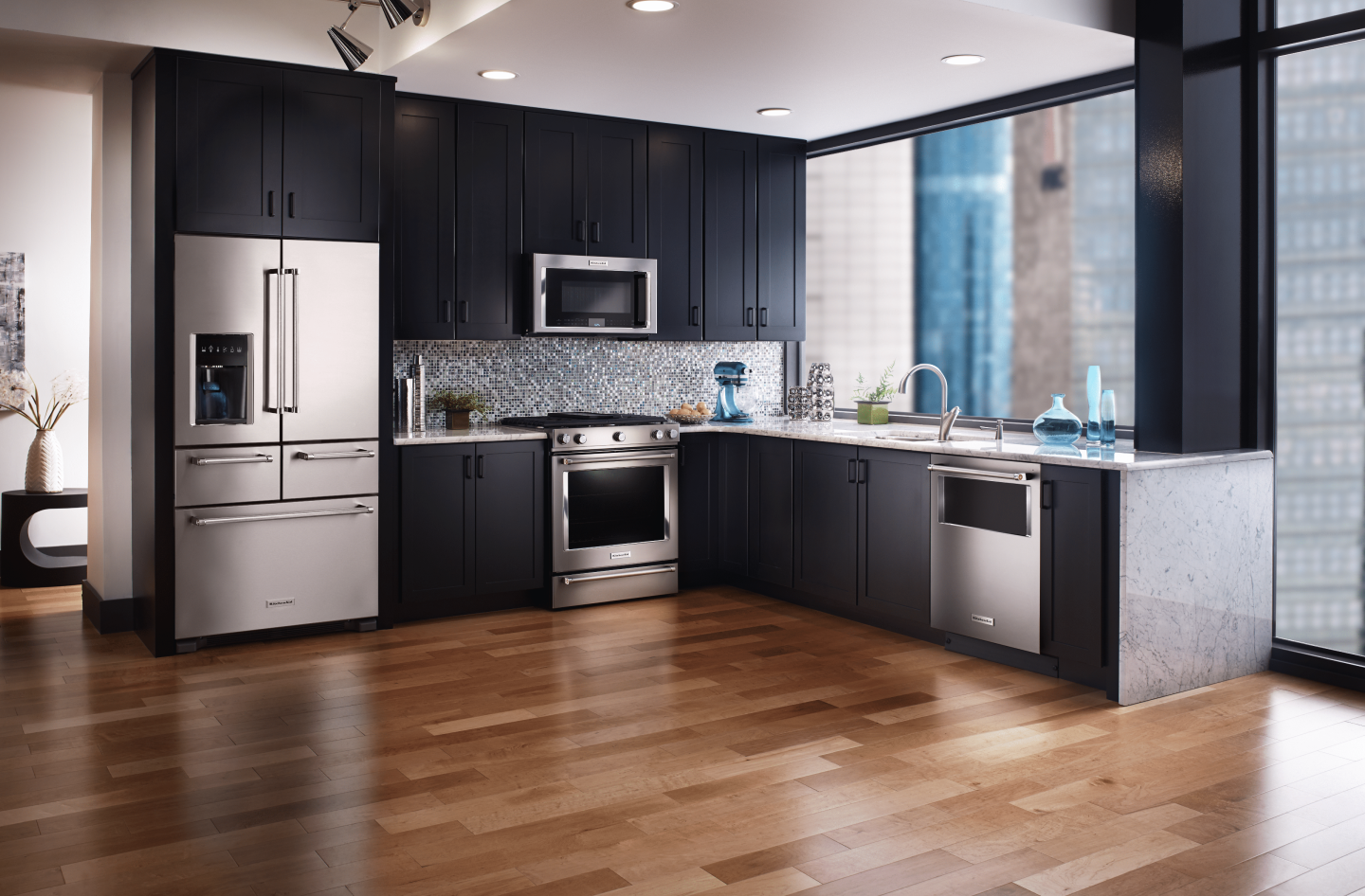 Stainless steel refrigerator with bottom freezer in L-shaped kitchen Stainless steel refrigerator with bottom freezer in L-shaped kitchen