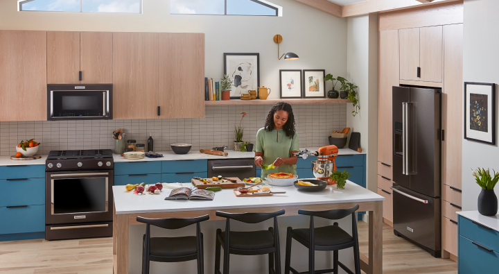 Person preparing meals at an island