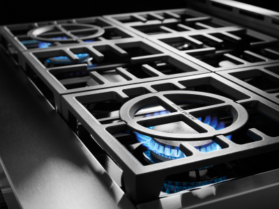 A closeup of a burner on a gas stove A closeup of a burner on a gas stove