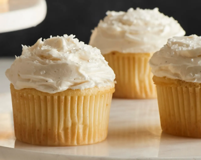 Buttercream frosting spread on a cupcake