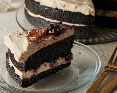 Frosting on a two-layer chocolate cake