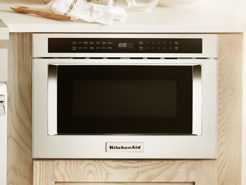 A KitchenAid® undercounter microwave in light cabinetry A KitchenAid® undercounter microwave in light cabinetry