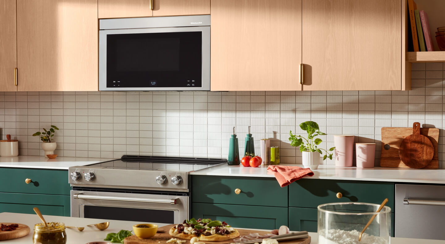 KitchenAid® over-the-range microwave above a KitchenAid® electric range KitchenAid® over-the-range microwave above a KitchenAid® electric range