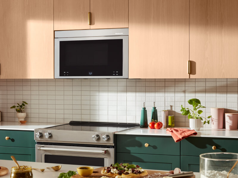 KitchenAid® over-the-range microwave above a KitchenAid® electric range