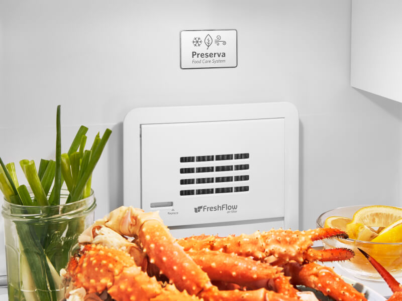 Fresh crab legs inside a KitchenAid® refrigerator