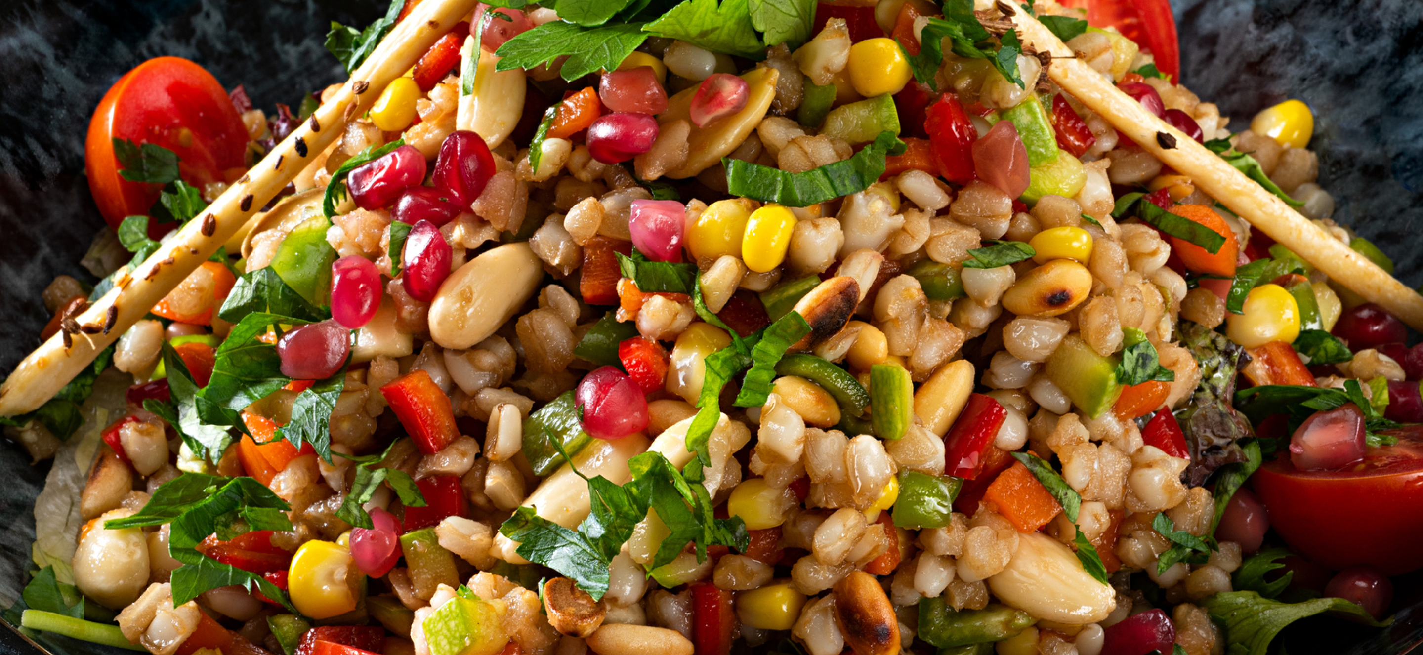 Bean and grain salad with vegetables and dressing