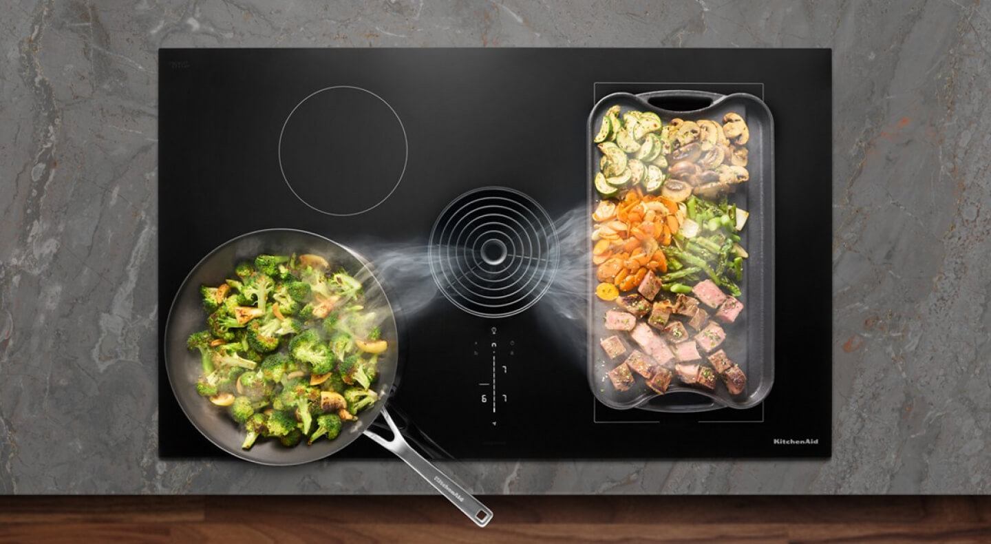 Downdraft ventilation on an induction cooktop